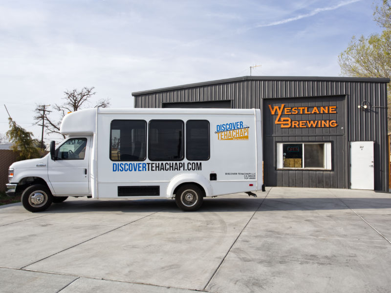 Discover Tehachapi bus in front of Westlane Brewery